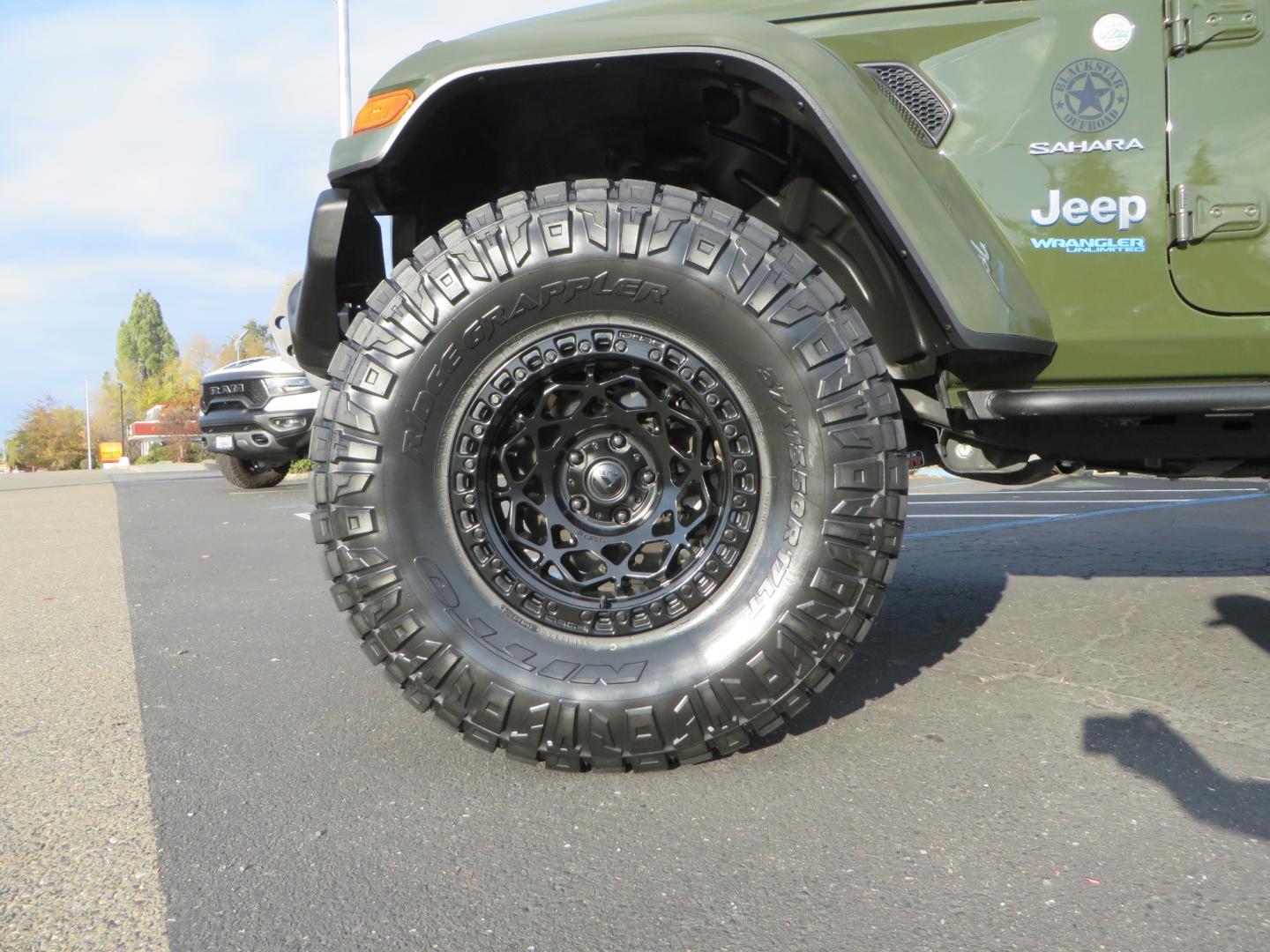 2021 Sarge Green /BLACK Jeep Wrangler Unlimited Sahara 4XE 4d SUV 4wd (1C4JJXP6XMW) with an 2.0L I4 DOHC DI Turbo PHEV engine, 8-speed Automatic transmission, located at 2630 Grass Valley Highway, Auburn, CA, 95603, (530) 508-5100, 38.937893, -121.095482 - 4XE Sahara with a Teraflex suspension system, Falcon shocks, 17" Fuel Offroad wheels, and 37" Nitto Ridge Grappler tires. - Photo#8